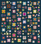 A quilt with a geometric pattern featuring various colored stars on a dark background.